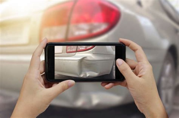 What should I do if someone hits my parked car?